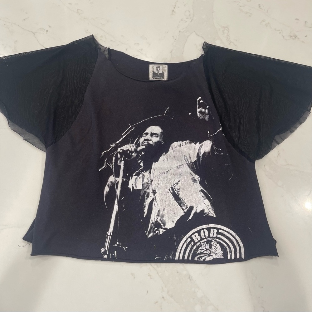 Gently worn Furst Of A Kind black and mesh sleeve Bob Marley tshirt